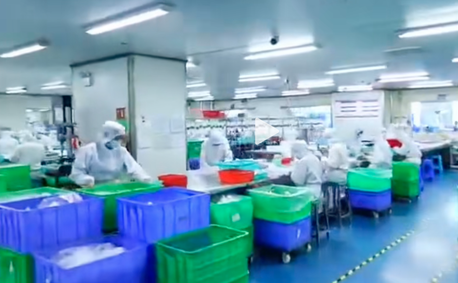 A screenshot from Flexicare Dongguan's factory tour video shows workers producing medical supplies