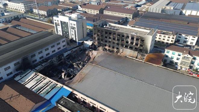 A drone image from Dawan News shows the five-storey Tiantianrun factory building’s charred exterior, and the effect on the crowded surrounding area. Source: Dawan News 