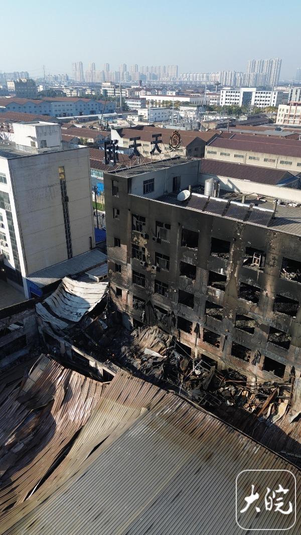 A drone image from Dawan News shows the five-storey Tiantianrun factory building after the fire. Source: Dawan News