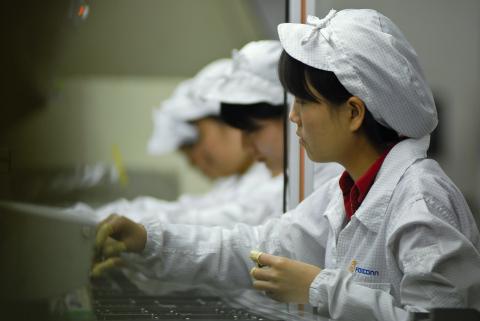 Foxconn workers working.